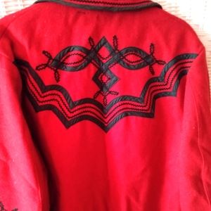 Red jacket, black braid trimmed